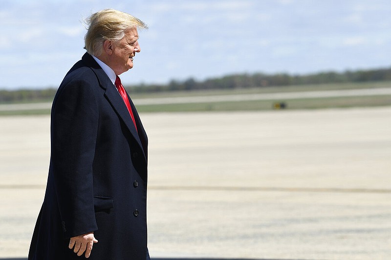 President Donald Trump walks towards the steps of Air Force One at Andrews Air Force Base in Md., Monday, April 15, 2019. Trump is heading to Minnesota for a tax day event.