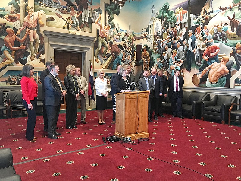 Rep. Peggy McGaugh, R-Carrollton, discusses the role of the newly-established Missouri General Assembly Local Government Caucus to a crowd Monday inside the Missouri House Lounge at the Capitol.