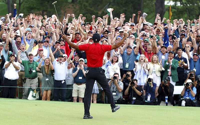 Tiger Woods reacts as he wins the Masters golf tournament Sunday, April 14, 2019, in Augusta, Ga. (Curtis Compton/Atlanta Journal-Constitution via AP)