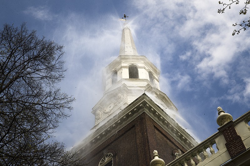 The historic Christ Church test its fire suppression system ahead of summer renovations in Philadelphia, Wednesday, April 17, 2019. (AP Photo/Matt Rourke)