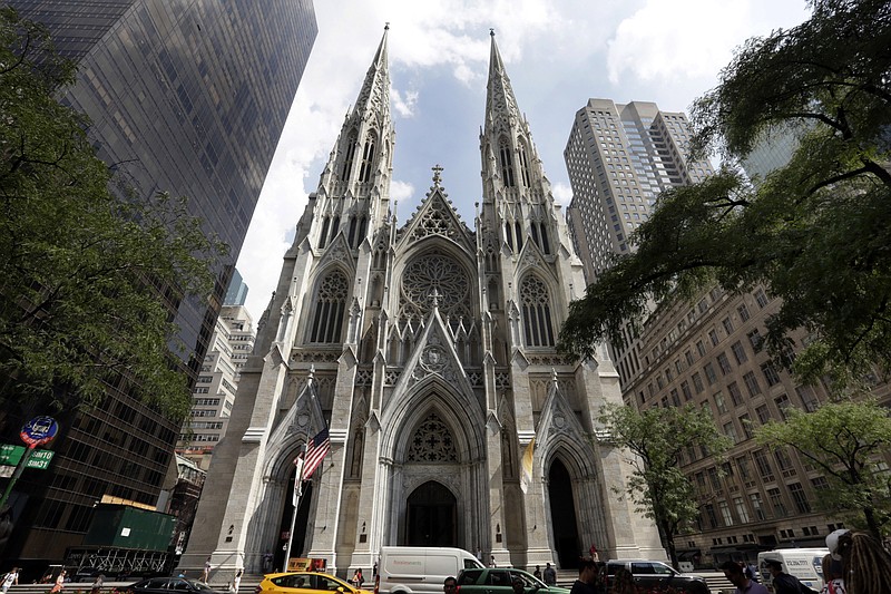 This Sept. 6, 2018, photo shows St. Patrick's Cathedral in New York. A New Jersey man has been arrested outside the cathedral with two jugs of gasoline. Police say church personnel stopped the 37-year-old man from entering the landmark cathedral in Manhattan at about 9 p.m. Wednesday, April 17, 2019. Authorities were investigating whether the unidentified man is emotionally disturbed. (AP Photo/Richard Drew)