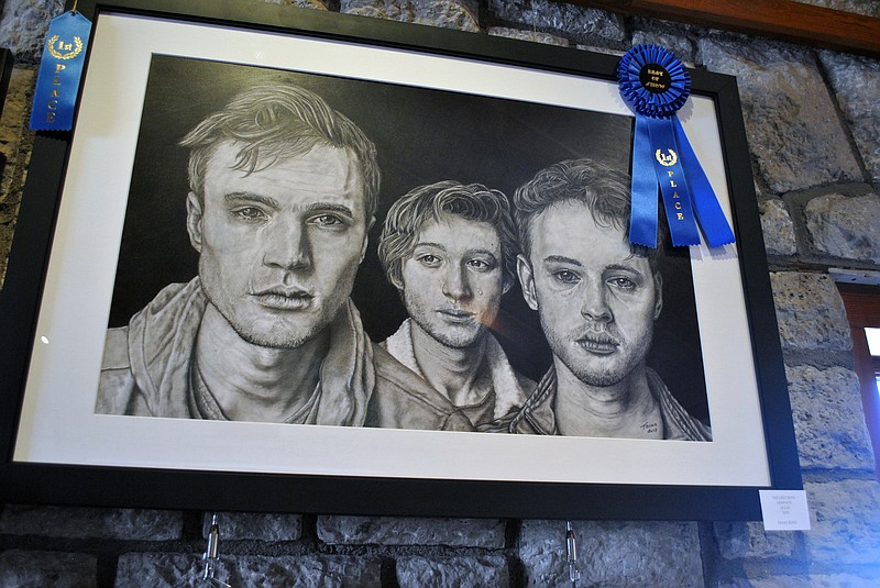 In 2019, Travis Bond earned first place in the charcoal/graphite/ink category and "Best of Show" in the professional artist division of the Jefferson City Art Club's Adult Fine Arts Show, which went on display at Capital Arts Gallery and became featured as part of the 2019 Spring Art Around Town Gallery Crawl on April 26, 2019.