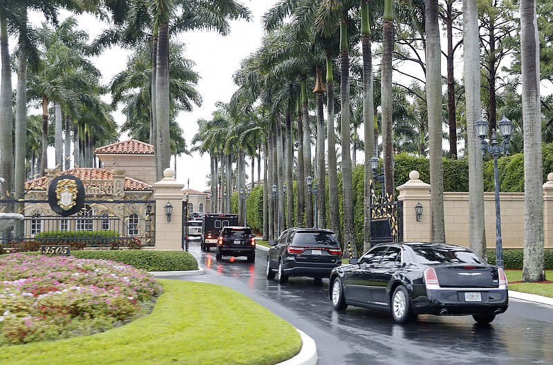 President Donald Trump and his accompanying motorcade vehicles arrive at Trump International Golf Club, Friday, April 19, 2019 in West Palm Beach, Fla. (AP Photo/Pablo Martinez Monsivais)