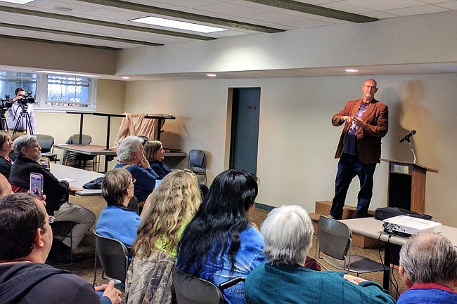 Dave Eaker, an alumnus of the Missouri School for the Deaf, shares his concerns about the potential placement of a justice center at a disused building on the MSD campus. Many other alumni shared similar reservations during a Friday forum at William Woods University.