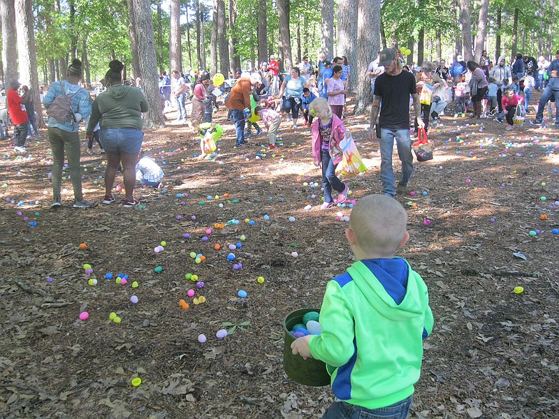 Children participate in the third annual Community Easter Egg Hunt on Saturday at Spring Lake Park. An estimated 5,000 youngsters hunted for approximately 40,000 eggs. 