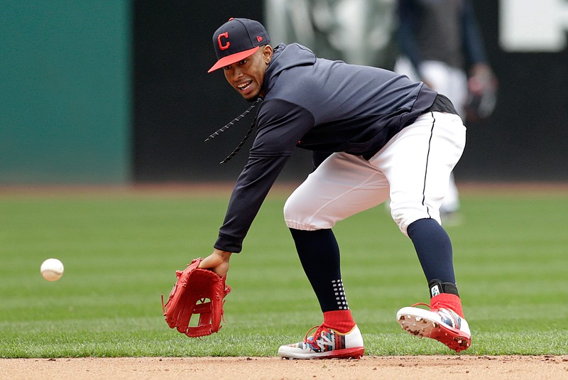 Cleveland Indians' Francisco Lindor fields a ball during batting practice before the first game of a baseball doubleheader against the Atlanta Braves, Saturday, April 20, 2019, in Cleveland. Lindor is back after missing the season's first 18 games. (AP Photo/Tony Dejak)
