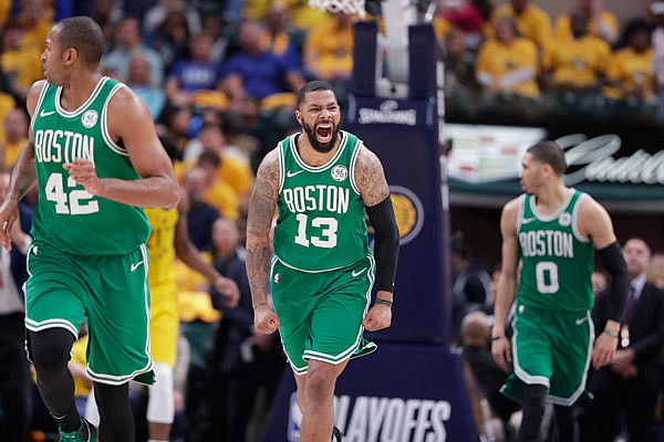 Celtics forward Marcus Morris (center) celebrates during the second half Sunday in Game 4 of an Eastern Conference first-round playoff series against the Pacers in Indianapolis. The Celtics defeated the Pacers 110-106 to win the series 4-0.