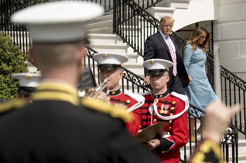 President Donald Trump and first lady Melania Trump arrive for the annual White House Easter Egg Roll on the South Lawn of the White House, Monday, April 22, 2019, in Washington. (AP Photo/Andrew Harnik)
