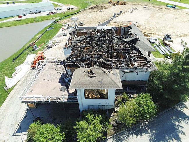 Photographs taken by a drone shows the extent of damage to the unfinished Callaway County Ambulance District headquarters. The fire was caused by a lightning strike, authorities have concluded.