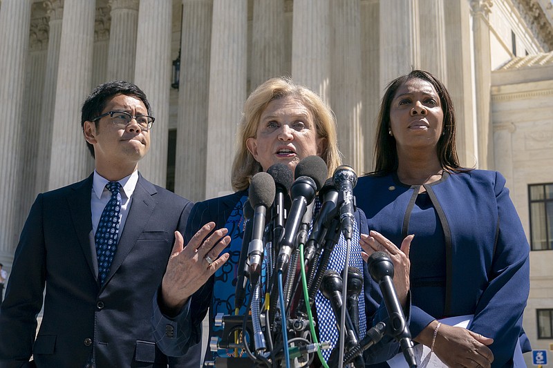 Rep. Carolyn Maloney, D-N.Y., center, joined from left by Dale Ho, attorney for the American Civil Liberties Union, and New York State Attorney General Letitia James, speaks to reporters after the Supreme Court heard arguments over the Trump administration's plan to ask about citizenship on the 2020 census, in Washington, Tuesday, April 23, 2019. Critics say adding the question would discourage many immigrants from being counted, leading to an inaccurate count. (AP Photo/J. Scott Applewhite)