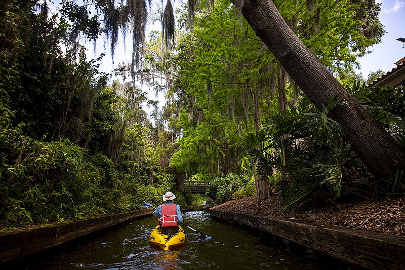 Joe Koerner leads a kayak tour of the Winter Park Chain of Lakes through Venetian Canal with Peace of Mind Kayak Tours on April 8, 2019, in Winter Park, Fla. (Patrick Connolly/Orlando Sentinel/TNS)