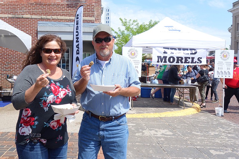 Theresa and John Hogg, of Boonville, enjoy fried morels at Morels and Microbrews Saturday, April 27, 2019, in Fulton.