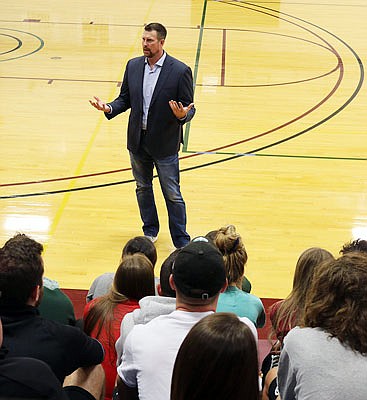 Former NFL quarterback Ryan Leaf speaks to William Woods University student-athletes and coaches Friday afternoon at Anderson Arena in Fulton.