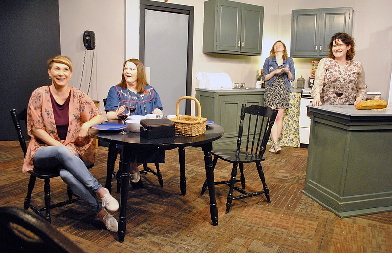 Maria, played by Shellie Howser, second from left, enjoys wine and talks with her three daughters — oldest Caterina, played by Jamie Waier, left, middle Angela, played by Erin Matteson, second from right, and youngest Michelle, played by Jessi Green — during rehearsals of local playwright Mary Jo LaCorte's "Love's Calling," which will hit the Scene One Theatre stage May 9-11 and 16-18, 2019.
