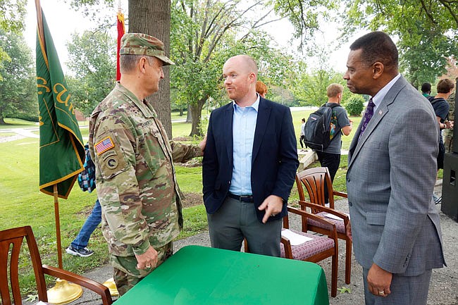 From left, Major Gen. Stephen Danner, adjutant general of the Missouri Army National Guard, chats with state Rep. Travis Fitzwater and retired Major Gen. Byron Bagby at an event at William Woods University in Fulton.