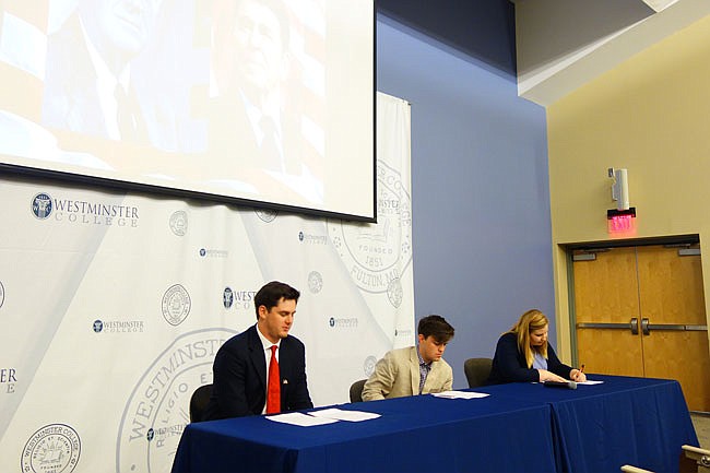 Political science and history students at Westminster College participated in a series of debates as former presidents Ronald Reagan and Franklin D. Roosevelt. Participants included Andrew Bennett, left, Jackson Berger and Missy Rolseth.