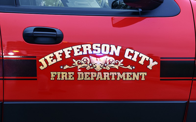Julie Smith/News Tribune
Jefferson City firefighters remained on the scene in the 500 block of Eastland until past 8 a.m. Tuesday after being called out to battle a residential fire around 5 a.m. Everyone was able to safely leave the house after they were awakened by a smoke detector.