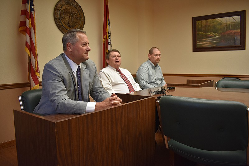 Sevier County officials answer questions during a press conference Thursday about the fate of De Queen Medical Center Inc. From left are Sevier County Rural Development Authority chariman Dr. Steve Cole, Sevier County Judge Greg Ray and De Queen Mayor Jeff Brown.
