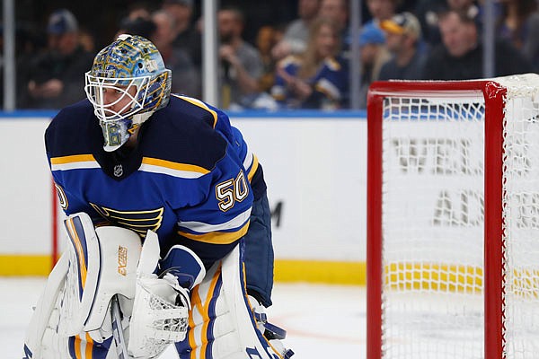 Blues goaltender Jordan Binnington takes a break during Friday night's playoff game against the Stars in St. Louis.