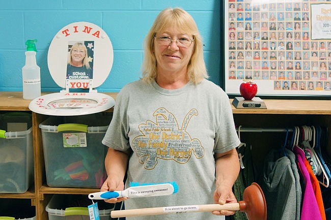 Students and staff at Bartley Elementary put messages of support and love on cleaning tools for Tina Bezler, the Fulton Public Schools Support Staff of the Year. Bezler is the day custodian at Bartley.