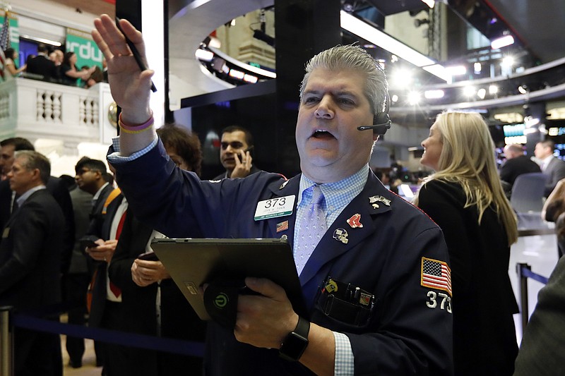 FILE - In this April 11, 2019, file photo trader John Panin works on the floor of the New York Stock Exchange. The U.S. stock market opens at 9:30 a.m. EDT on Tuesday, May 7. (AP Photo/Richard Drew, File)