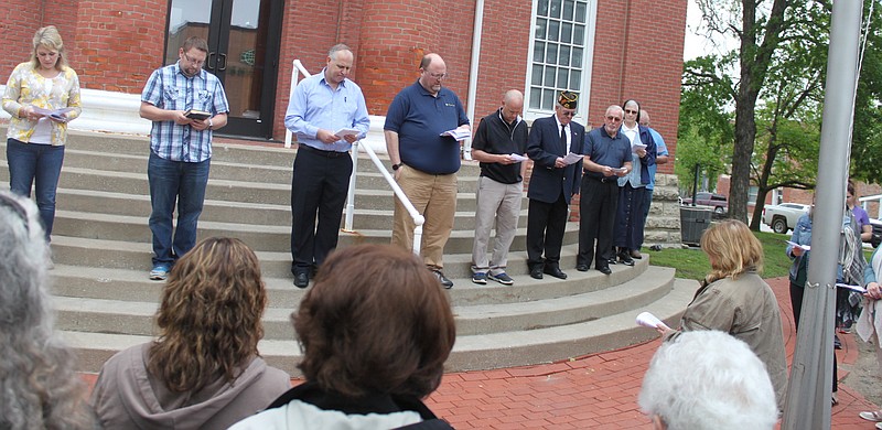 Pastors with the California Ministerial Alliance lead Moniteau County officials in a moment of prayer and thanksgiving May 2 for the National Day of Prayer. This year's fellowship was held at the Moniteau County Courthouse. 