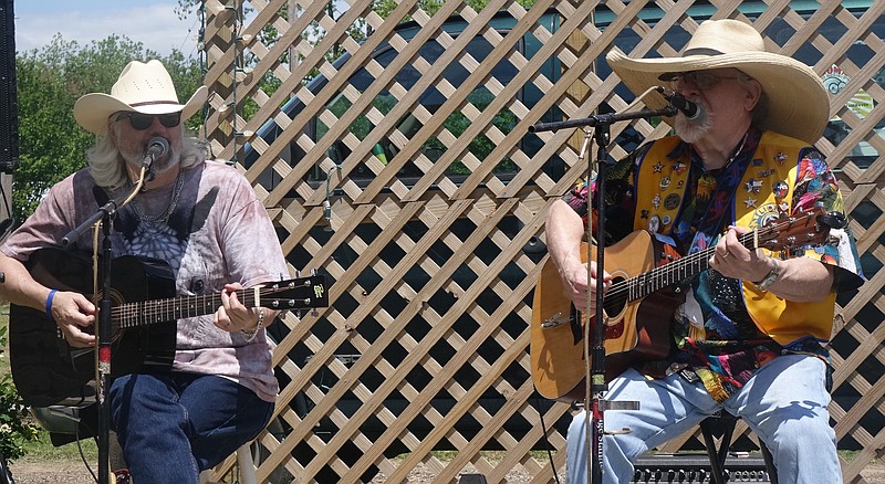 Lucky Boyd, left, and Richard Bowden of Linden, Texas, perform April 7 during the Linden Wildflower Trails of Texas. 