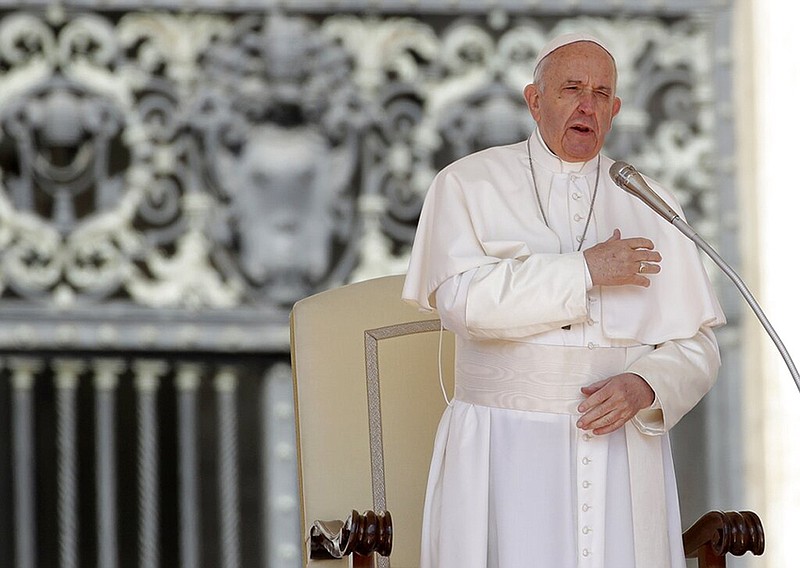 Pope Francis does the sign of the cross during his weekly general audience, in St. Peter's Square, at the Vatican, Wednesday, May 8, 2019.