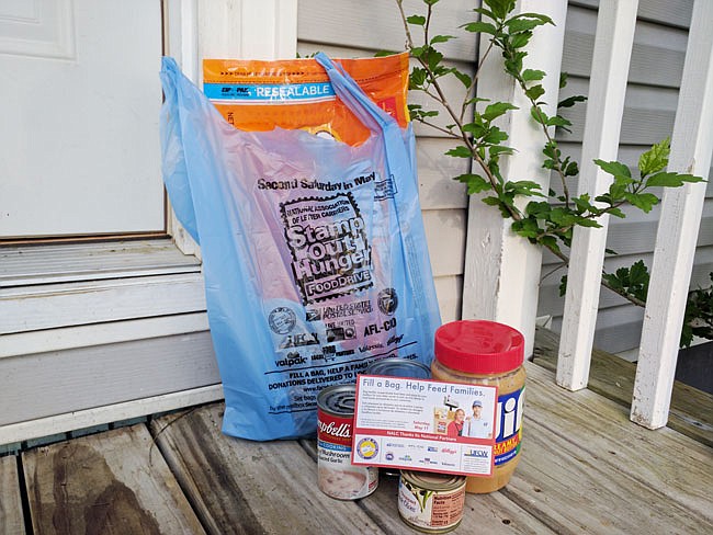 Check your mailbox for a blue bag — it's time for the Stamp Out Hunger food drive. Fill the bag with nonperishable food items (or use the included envelope for a monetary donation) and leave it out for your mail carrier Saturday to participate.