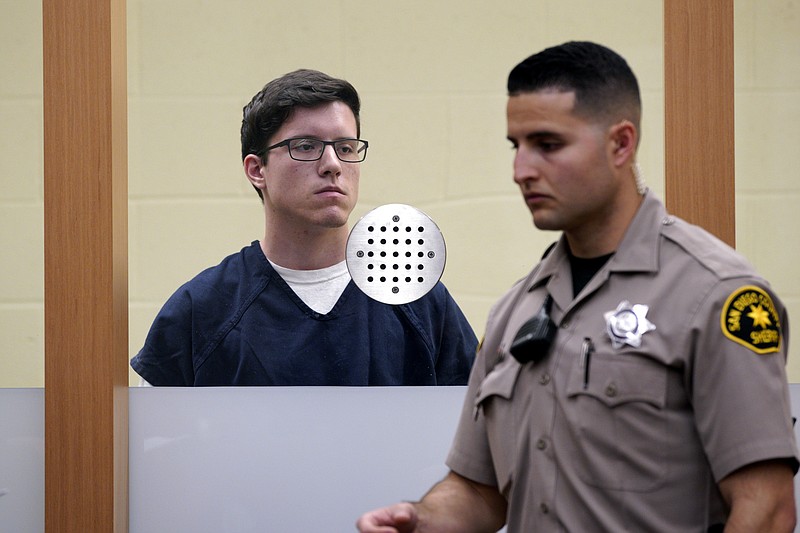 FILE - In this April 30, 2019 file photo John T. Earnest appears for his arraignment hearing in San Diego. Federal officials announced Thursday, May 9, 2019, that they have filed 109 hate crime charges against Earnest accused of opening fire in a Southern California synagogue on April 27,  the last day of Passover, a major Jewish holiday.  (Nelvin C. Cepeda/The San Diego Union-Tribune via AP, Pool, File)