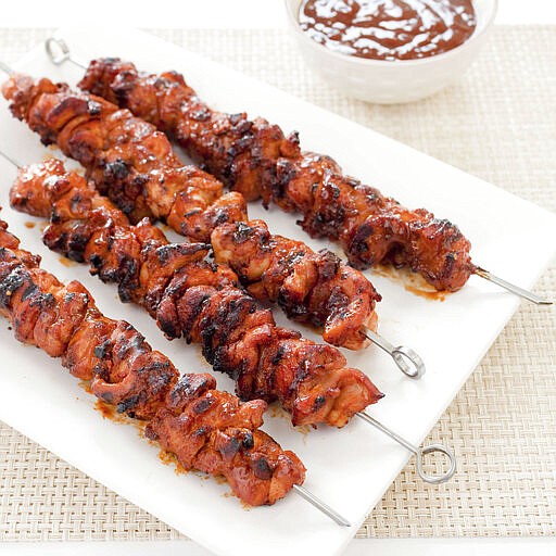 This undated photo provided by America's Test Kitchen in April 2019 shows Barbecued Chicken Kebabs in Brookline, Mass. This recipe appears in the cookbook "Master of the Grill." (Carl Tremblay/America's Test Kitchen via AP)