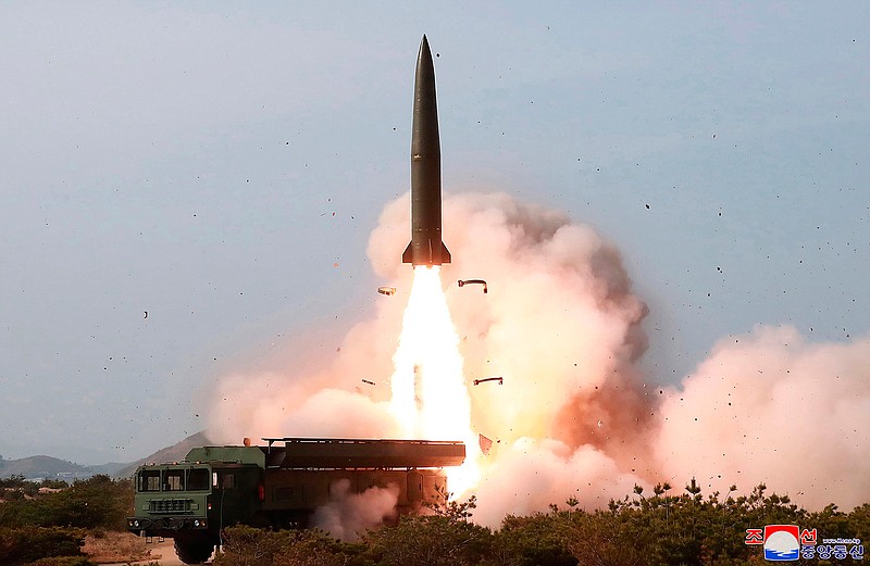 This May 4, 2019, file photo provided by the North Korean government shows a launch of a missile in the east coast of North Korea. Experts say North Korea's latest launches suggest it may have acquired or cloned a short-range missile the Russian military has long earmarked for export. It's still unclear if the North bought them or built them itself, but experts say the missiles it launched over the past week look just like a nuclear-capable ballistic missile that has long been a source of tension in Europe. Korean language watermark on image as provided by source reads: "KCNA" which is the abbreviation for Korean Central News Agency.  (Korean Central News Agency/Korea News Service via AP, File)