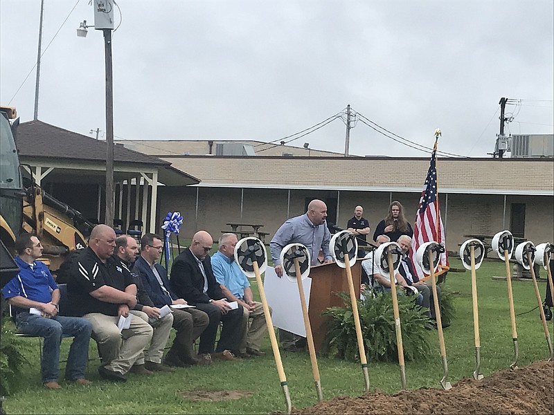 Corey Calicott, a political action committee president, speaks at a ground-breaking celebration for Redwater, Texas' new high school. The project is expected to be completed by August 2020.