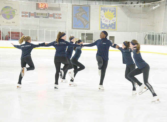 Members of Team Radiance demonstrate their winning moves Thursday, May 8, 2019, on the ice at Washington Park Ice Arena in Jefferson City.