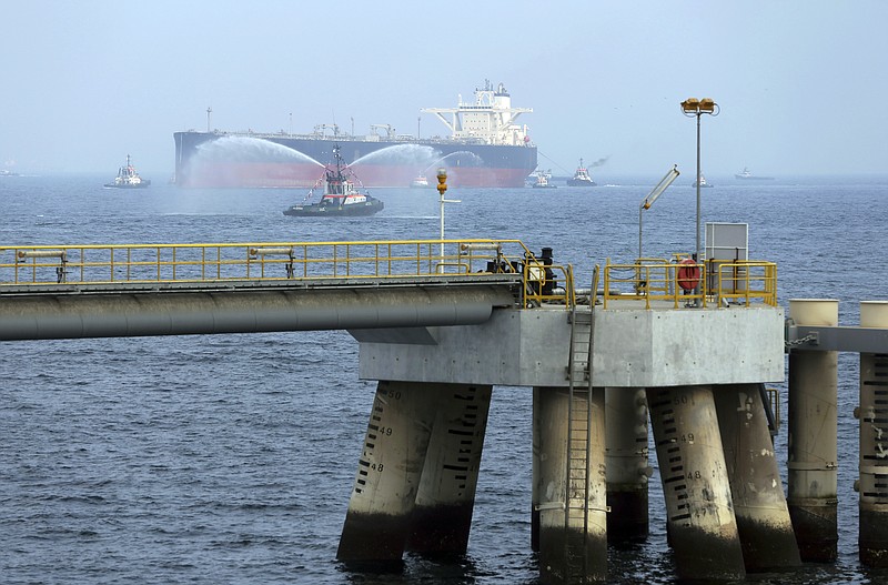 FILE - In this Sept. 21, 2016 file photo, an oil tanker approaches to the new Jetty during the launch of the new $650 million oil facility in Fujairah, United Arab Emirates. The United Arab Emirates said Sunday, May 12, 2019 that four commercial ships near Fujairah "were subjected to sabotage operations" after false reports circulated in Lebanese and Iranian media outlets saying there had been explosions at the Fujairah port. (AP Photo/Kamran Jebreili)