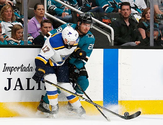 Jaden Schwartz of the Blues works for the puck against Timo Meier of the Sharks during Saturday night's Game 1 of the Western Conference finals in San Jose, Calif. Game 2 is tonight.