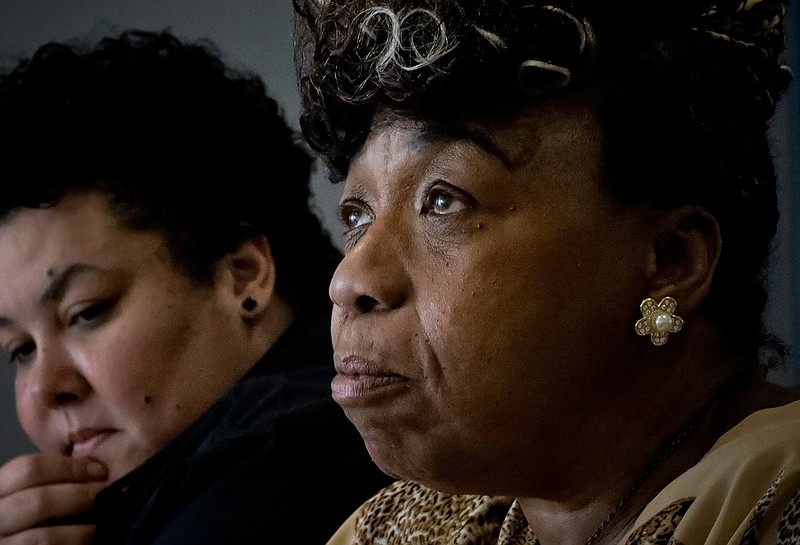 Loyda Colon, left, co-director of the Justice Committee, listens Wednesday, May 8, 2019, while Gwen Carr, right, mother of Eric Garner, speaks during an interview in New York. Garner was an unarmed black man who died as he was being subdued in a chokehold by New York Police Department Officer Daniel Pantaleo nearly five years ago. A New York City judge has cleared the way for a police disciplinary trial to begin today for Pantaleo in Garner's death, after rejecting his claim that a police watchdog agency didn't have jurisdiction to prosecute the case.