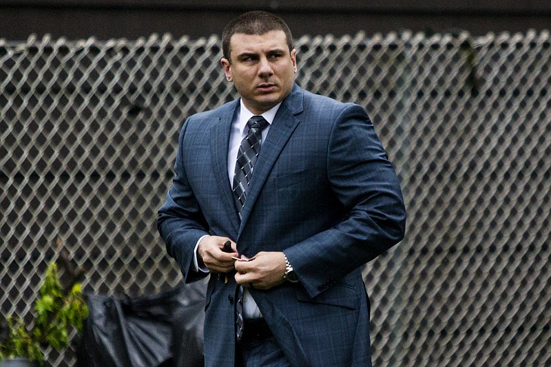 New York City police officer Daniel Pantaleo leaves his house Monday, May 13, 2019, in Staten Island, N.Y. A long-delayed disciplinary trial is set to begin Monday for Pantaleo, accused of using a banned chokehold in the July 2014 death of Eric Garner.  (AP Photo/Eduardo Munoz Alvarez)