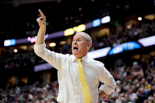 In this March 28 file photo, Michigan coach John Beilein shouts during the first half of the team's NCAA Tournament West Region semifinal against Texas Tech in Anaheim, Calif.