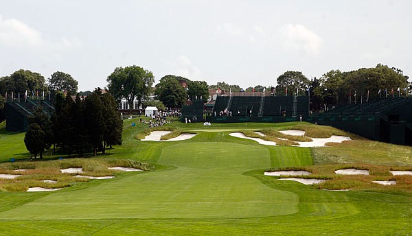 In this June 12, 2009, file photo, bunkers line the fairway and protect the green on the 18th hole of Bethpage State Park's Black Course in Farmingdale, N.Y.