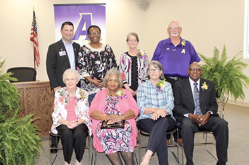 Ashdown School District recently honored nine teachers who are retiring. Shown, front row, from left, are Ruby Lee Rosenbaum, Annie Hopkins, Sandra Camp and Roy Burton; back row, Superintendent Casey Nichols, Barbara Hunter, Carmen Sansom and David Wilson. Not pictured are Lynda Cunningham and Lynda King. (Submitted photo)
