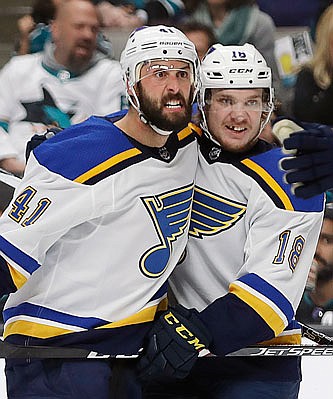 Robert Bortuzzo (left) celebrates Monday night with Blues teammate Robert Thomas after scoring a goal against the Sharks in San Jose, Calif. 