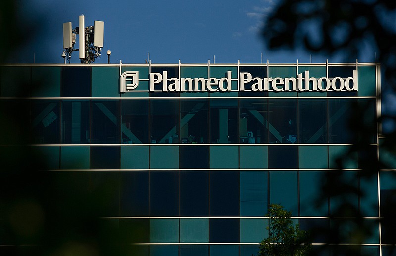 This April 19, 2019, file photo shows a Planned Parenthood building in Houston.  A federal appeals court is about to again take up the issue of whether and how states can cut off federal Medicaid funding for Planned Parenthood. Arguments are set for Tuesday, May 14. (Godofredo A Vasquez/Houston Chronicle via AP, File)