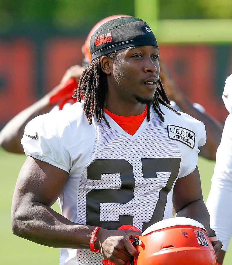 Cleveland Browns' Kareem Hunt warms up during an NFL football organized team activity session at the team's training facility Wednesday, May 15, 2019, in Berea, Ohio. (AP Photo/Ron Schwane)