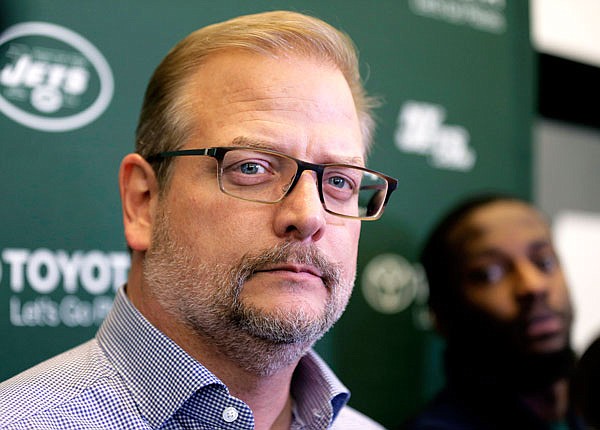 In this Dec. 31, 2018 file photo, Jets general manager Mike Maccagnan speaks to reporters in Florham Park, N.J.