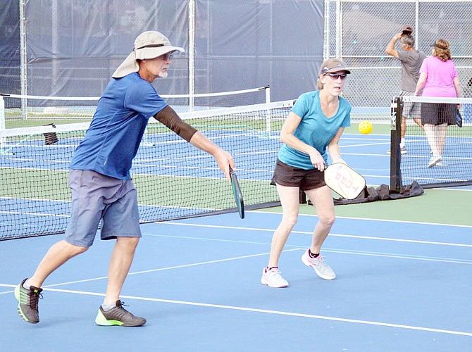 The new Jefferson City Pickleball Club practices Wednesday at the Lincoln University tennis courts. They will host their first pickleball tournament, Pickle-Dilly, this weekend at the same courts.