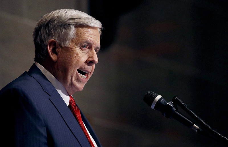 FILE - In this Jan. 16, 2019, file photo, Missouri Gov. Mike Parson delivers his State of the State address in Jefferson City, Mo. Parson on Wednesday, May 15, called on state senators to take action on a bill to ban abortions at eight weeks of pregnancy, the latest GOP-dominated state emboldened by the possibility that a more conservative Supreme Court could overturn its landmark ruling legalizing the procedure. (AP Photo/Charlie Riedel, File)