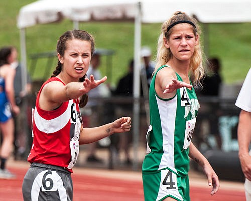 Emma Homfeldt (left) and the Calvary Lions and Lady Lions will participate in the Class 2 state track and field championships today and Saturday at Adkins Stadium.