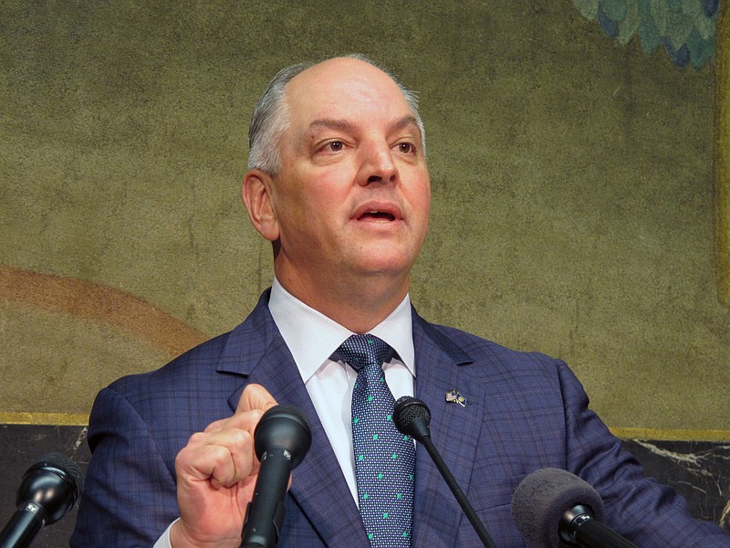FILE - In this Thursday, Sept. 20, 2018 file photo, Gov. John Bel Edwards talks about an expected $300 million-plus surplus Louisiana will have from the last budget year in Baton Rouge, La. Nearly three decades ago, when Democratic Louisiana Gov. John Bel Edwards’ wife was 20 weeks pregnant with their first child, a doctor discovered their daughter had spina bifida and encouraged an abortion. The Edwardses refused. Edwards, who has repeatedly bucked national party leaders on abortion rights, is about to do it again. He’s ready to sign legislation that would ban the procedure as early as six weeks of pregnancy, before many women know they are pregnant, when the bill reaches his desk. (AP Photo/Melinda Deslatte, File)