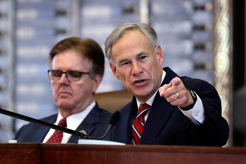 In this Feb. 5, 2019 file photo, Texas Gov. Greg Abbott, right, gives his State of the State address as Lt. Gov. Dan Patrick, left, listens in the House Chamber in Austin, Texas. A year after a high school mass shooting near Houston that remains one of the deadliest in U.S. history, Texas lawmakers are close to going home without passing any new gun restrictions, or even tougher firearm storage laws that Gov. Abbott had backed after the tragedy. A GOP governor pushing even a small restriction on firearm owners in gun-friendly Texas was a landmark shift after decades of loosening regulations. But it was met with a severe rebuke from gun-rights advocates. (AP Photo/Eric Gay, File)